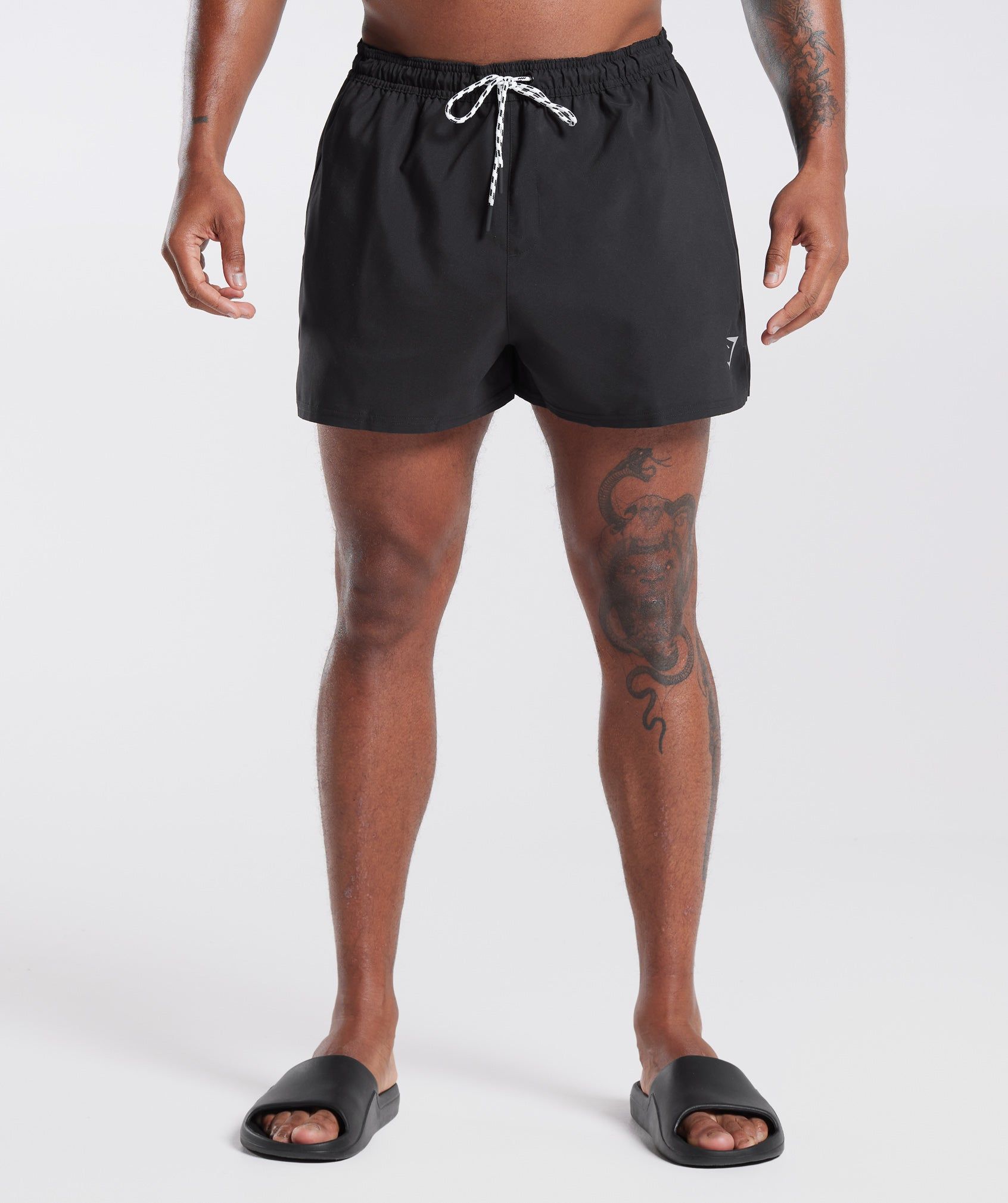 Mens swim trunks below the clearance knee