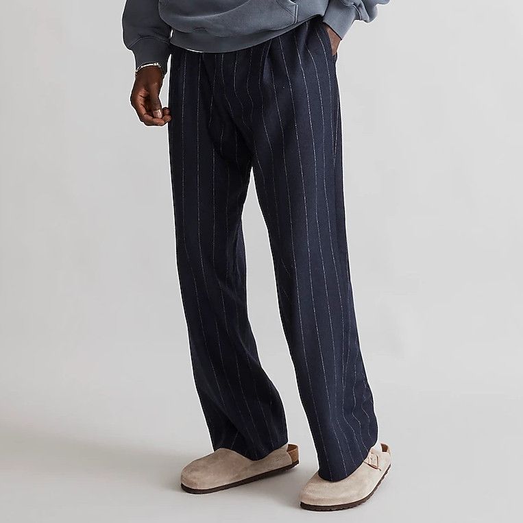 With slouchy men's trousers, a little leg goes a long way