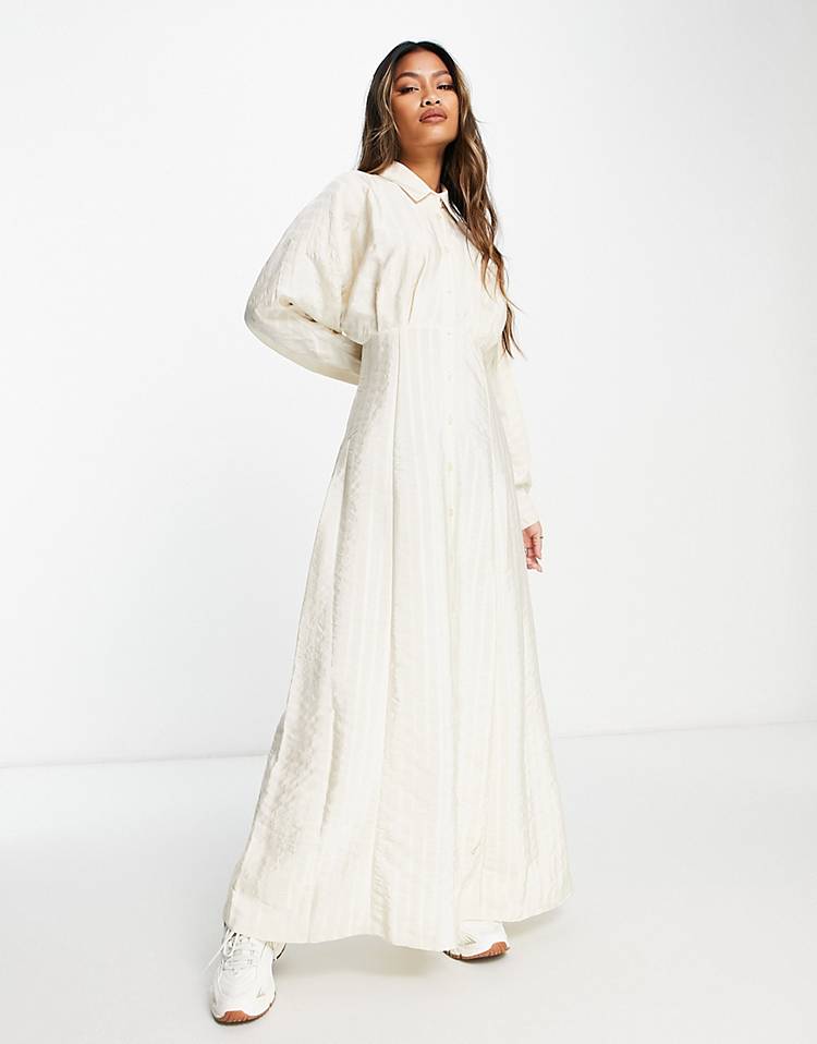 Vintage long shirt dress in cream color with textured stripes and puff sleeves