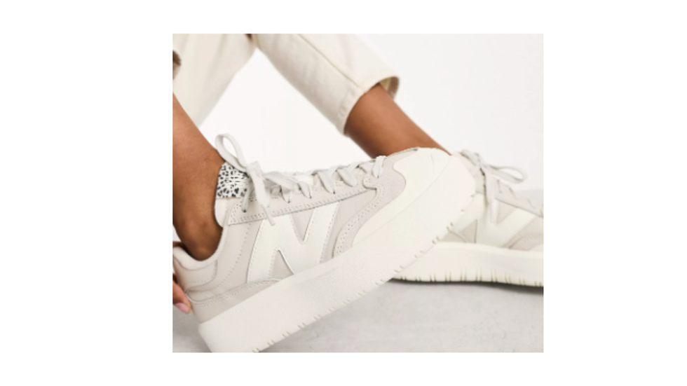 Sneakers bianco sporco con stampa leopardata New Balance 