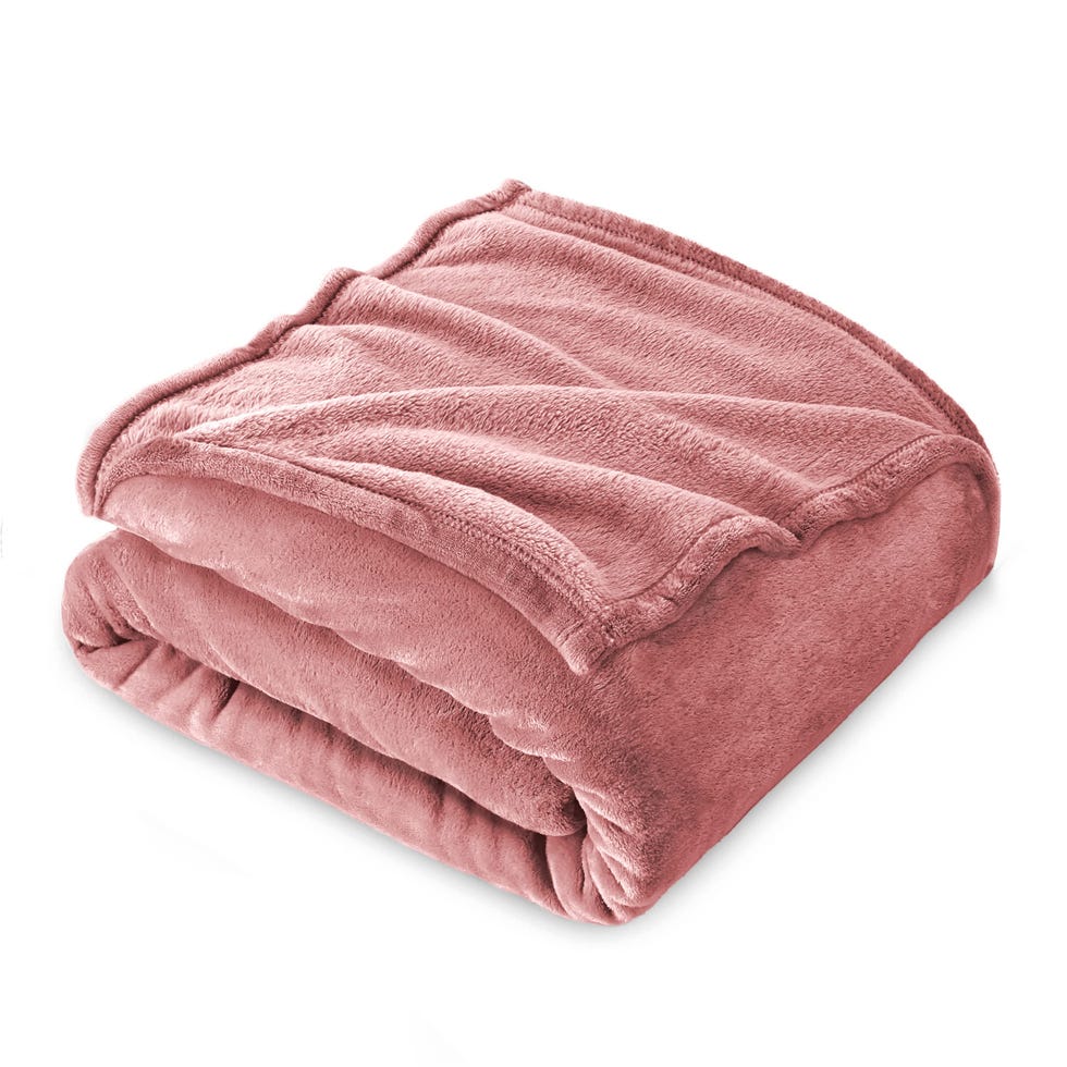 Manta rosa para las noches de peli y sofá 