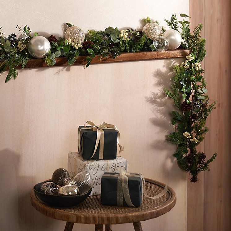 Pre lit garland on sale for stairs