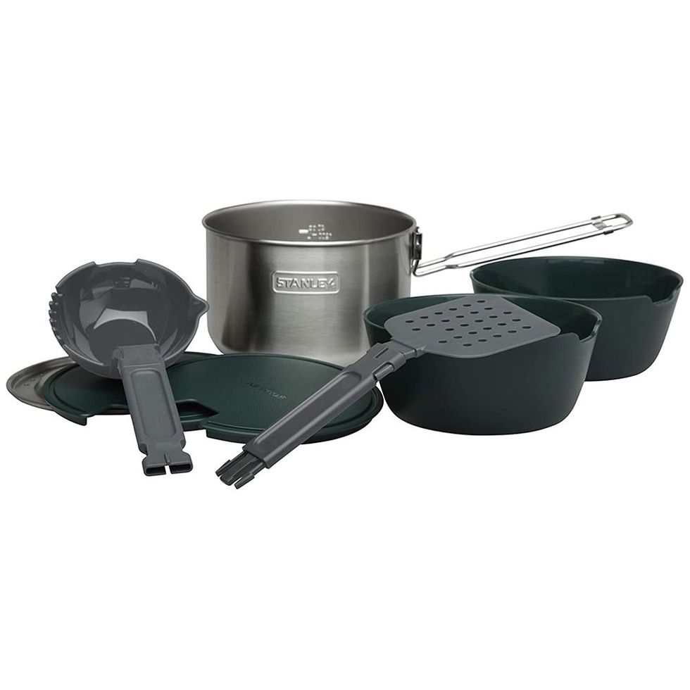 https://hips.hearstapps.com/vader-prod.s3.amazonaws.com/1696938544-1616447154-stanley-adventure-all-in-one-2-bowl-cook-set-1616447062.jpg?crop=1xw:1.00xh;center,top&resize=980:*