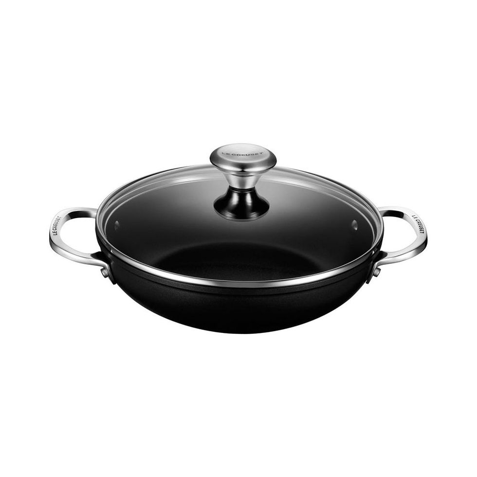 https://hips.hearstapps.com/vader-prod.s3.amazonaws.com/1696955099-le-creuset-toughened-nonstick-shallow-casserole-braiser-with-glass-lid-65257ad6392b9.jpg?crop=1xw:1xh;center,top&resize=980:*