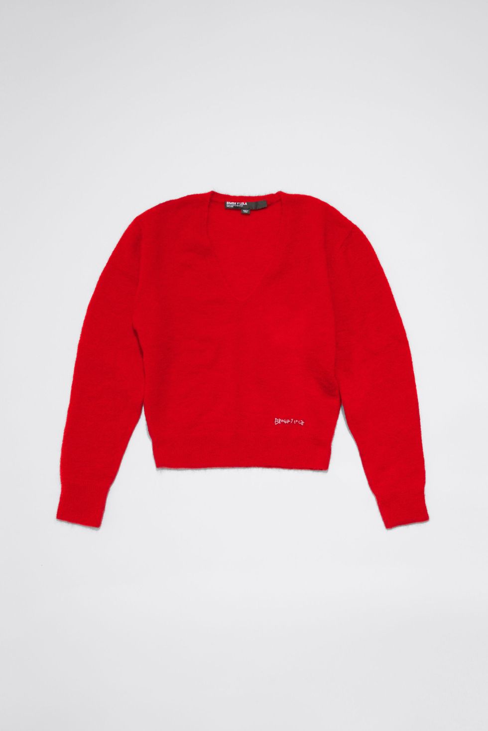 Los jerséis rojos están de moda este otoño y estos 15 son los más