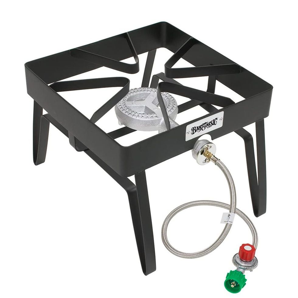 https://hips.hearstapps.com/vader-prod.s3.amazonaws.com/1698848661-1666383795-bayou-classic-sq14-16-in-outdoor-patio-stove-1666383791.jpg?crop=1xw:1.00xh;center,top&resize=980:*
