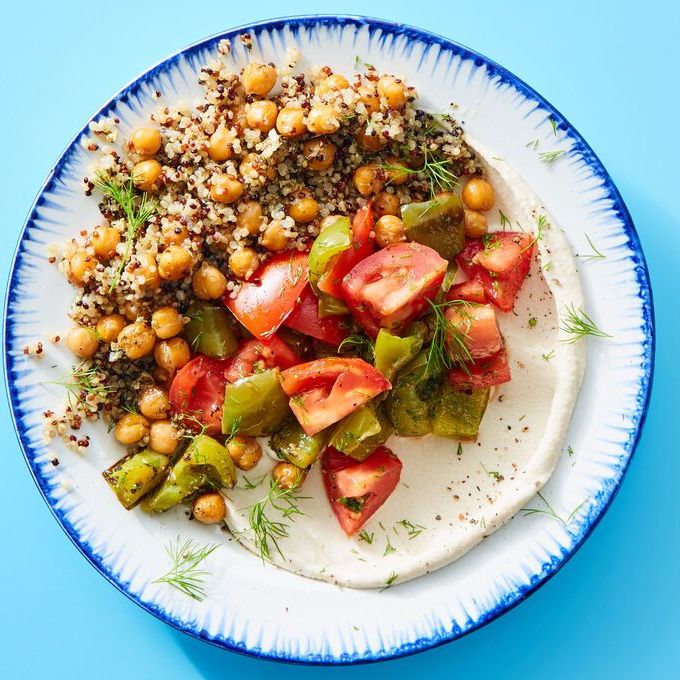 https://hips.hearstapps.com/vader-prod.s3.amazonaws.com/1699388150-quinoa-hummus-bowl-with-tomatoes-peppers-cbdb1ab0c611fc01f9f654a9adc5ec33.jpg?crop=0.668xw:1.00xh;0.155xw,0&resize=980:*