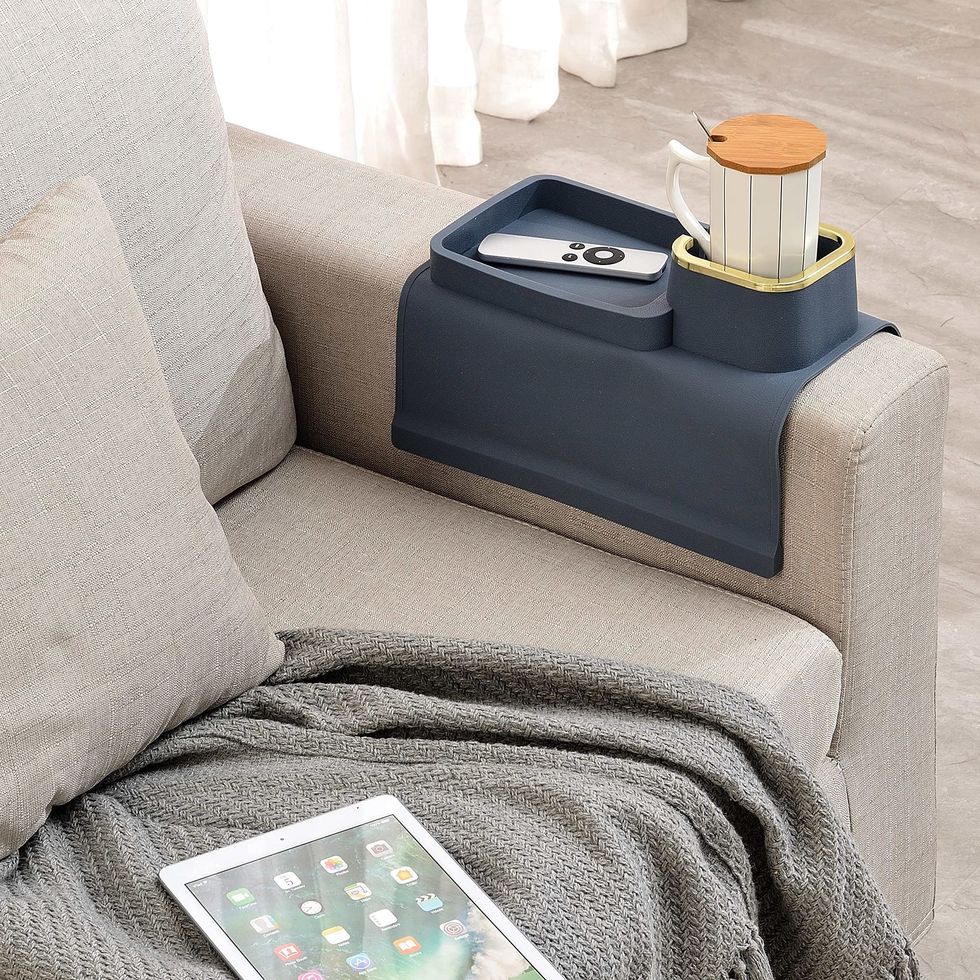 https://hips.hearstapps.com/vader-prod.s3.amazonaws.com/1699481240-couch-side-table-caddy-holder-christmas-gifts-for-mom-654c065425c0f.jpg?crop=1xw:1xh;center,top&resize=980:*