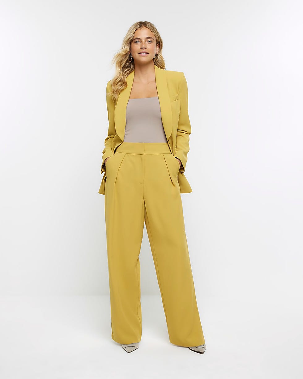 Yellow pleated wide leg trousers