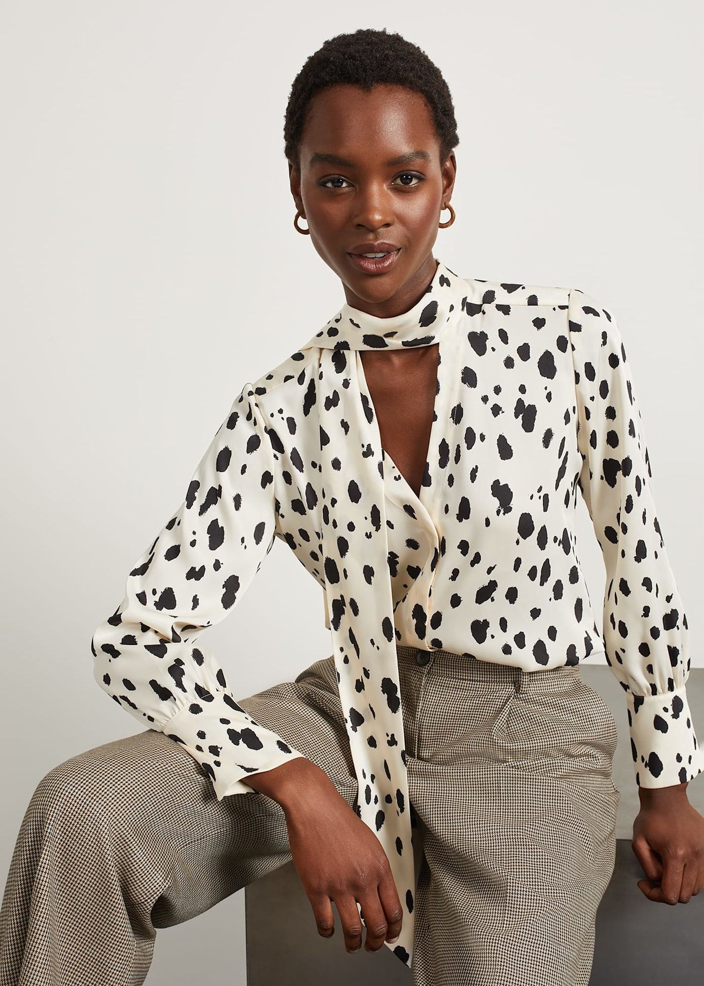 Black and white polka dot blouse store with bow