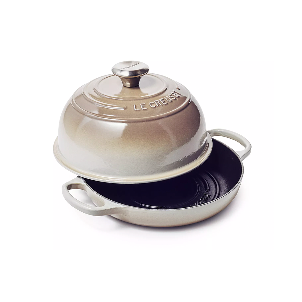 https://hips.hearstapps.com/vader-prod.s3.amazonaws.com/1699990653-le-creuset-enameled-cast-iron-bread-oven-6553cc6c147ad.png?crop=1xw:1xh;center,top&resize=980:*
