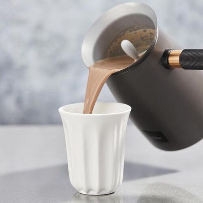 Brewing your coffee in this travel thermos is easier than using a Nespresso  - Yanko Design