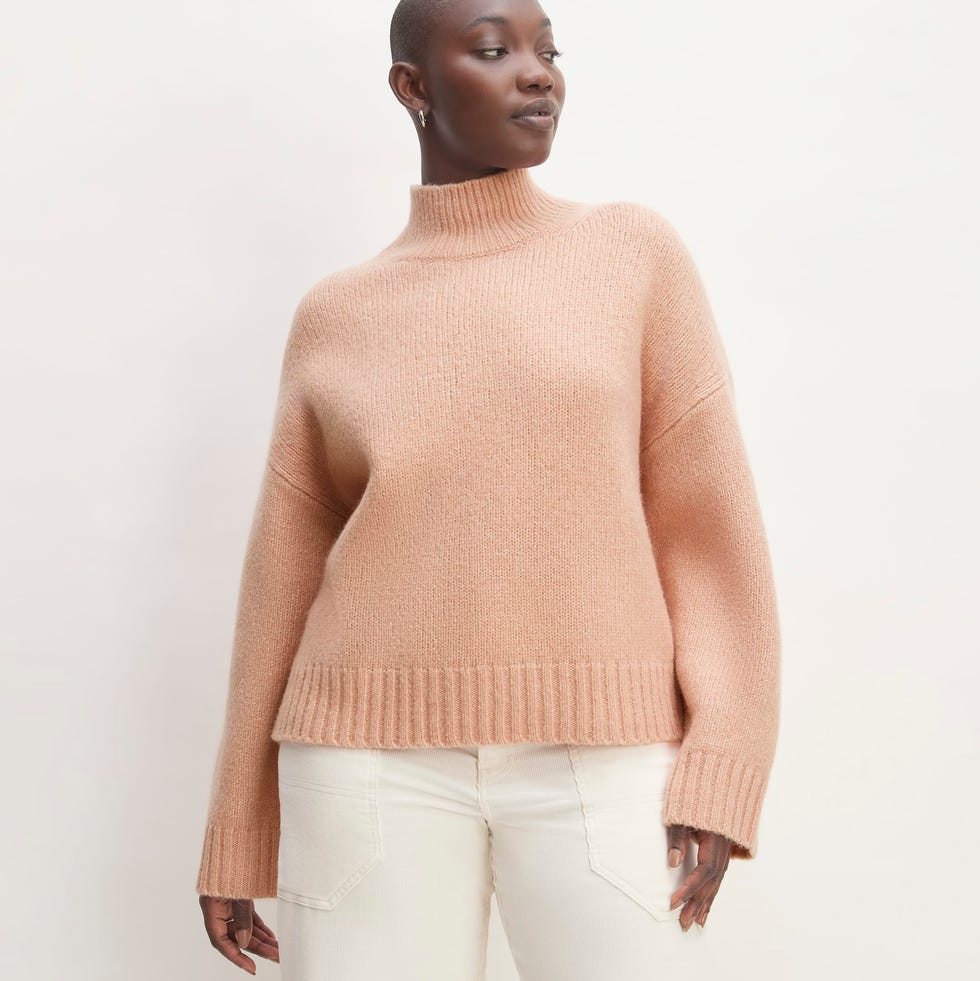 Cloud Oversized Turtleneck Sweater Discover the latest fashion trends with Pantone 2024 Color of the Year, Peach Fuzz. From cozy sweaters to trendy sneakers, let's explore!