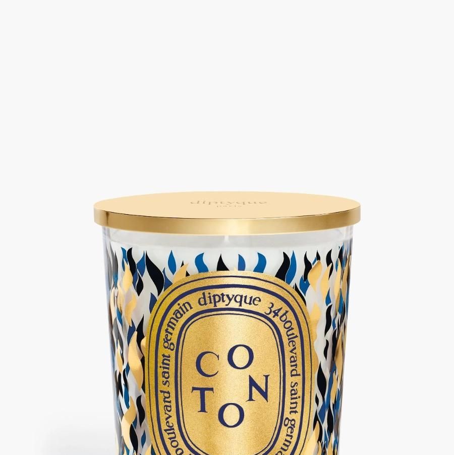 https://hips.hearstapps.com/vader-prod.s3.amazonaws.com/1702305087-diptyque-scented-candle-coton-190g-xm23b190c-bd-1.jpg?crop=1.00xw:0.751xh;0,0.168xh&resize=980:*
