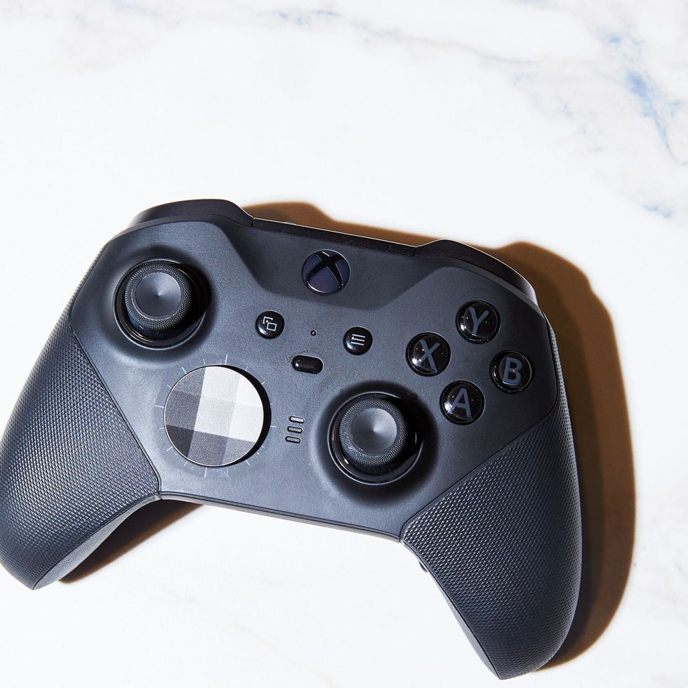 Xbox Elite Controller green button where paddles go is stuck down