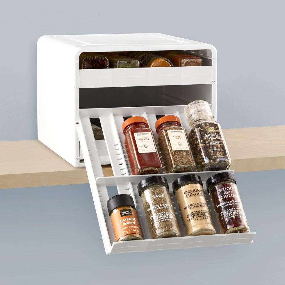 Our new pull-out spice racks are now as cute on the inside as they