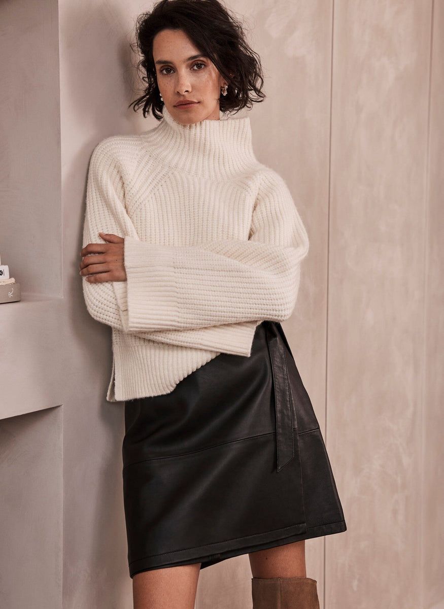 Turtleneck and store leather skirt