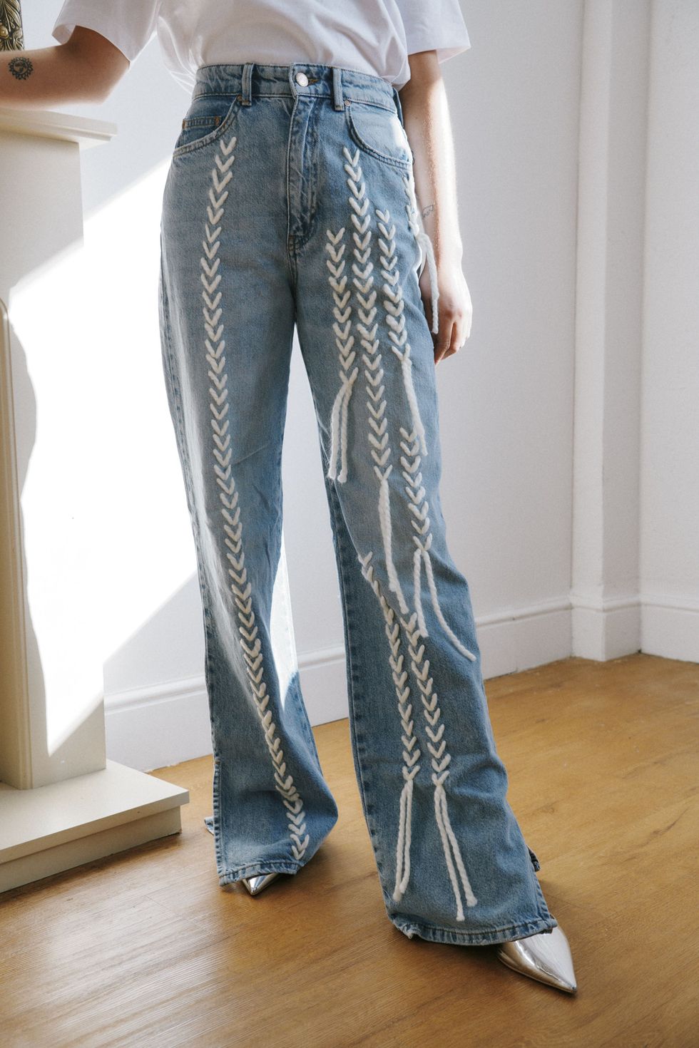 High waisted upcycled thread flare jeans
