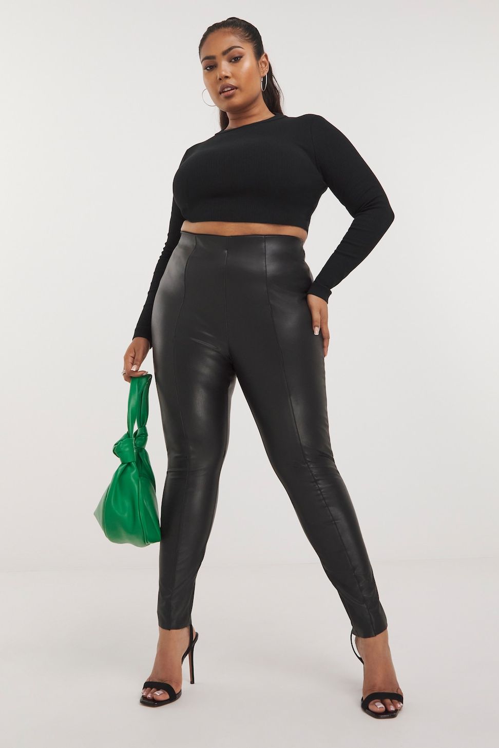 size 0 h&m faux black leather leggings, very trendy