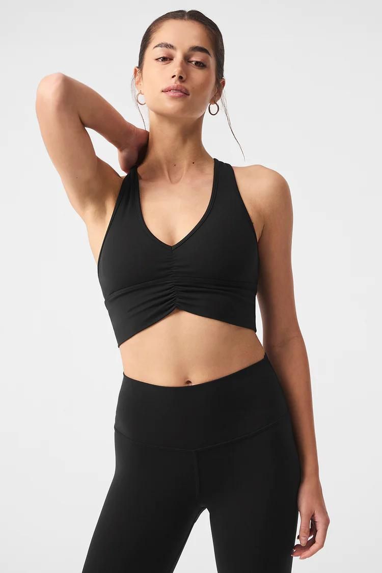 Alo Yoga Outfit seen on Kylie Jenner (Legit Stripe Legging & Slit Bra Black)