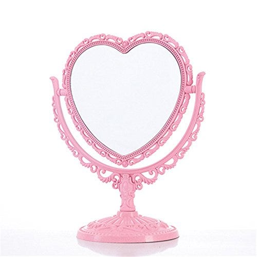 Espejo de maquillaje en forma de corazón