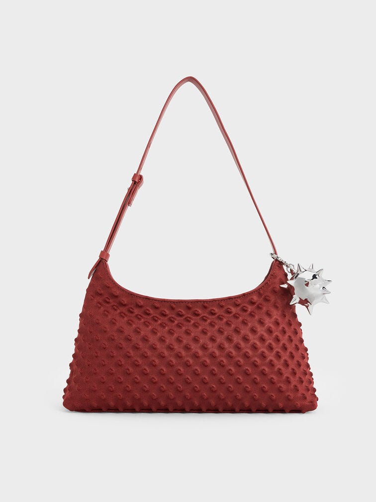 Bolso de hombro con textura de púas