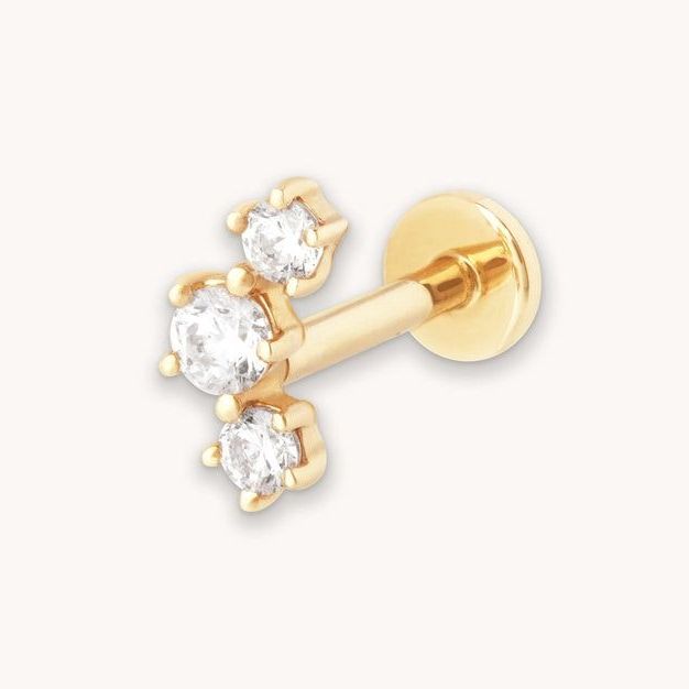Curved crystal piercing stud in solid gold