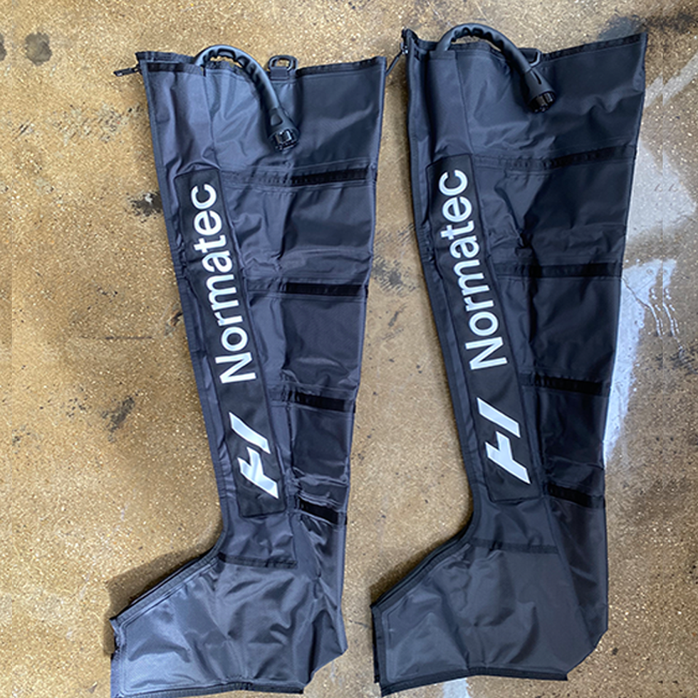 Do Compression Therapy Boots Work? Bob and Brad vs. Normatec Boots Review -  The Mother Runners