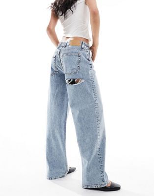 ASOS DESIGN baggy boyfriend jean in light tint with cheeky rip