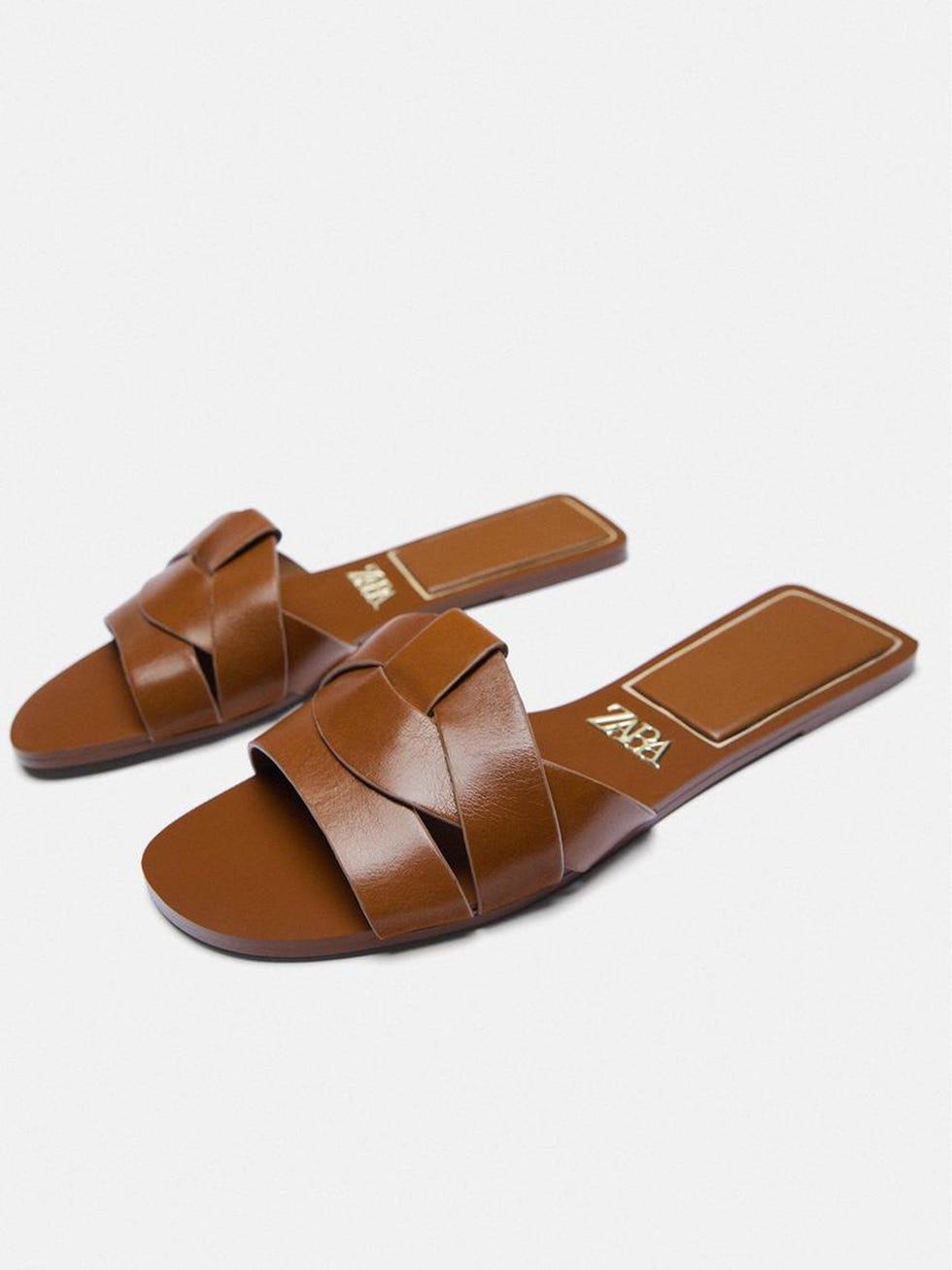 Flat criss-cross leather sandals