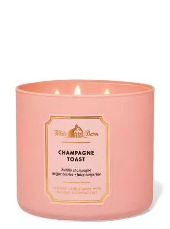 Three wick champagne toast candle