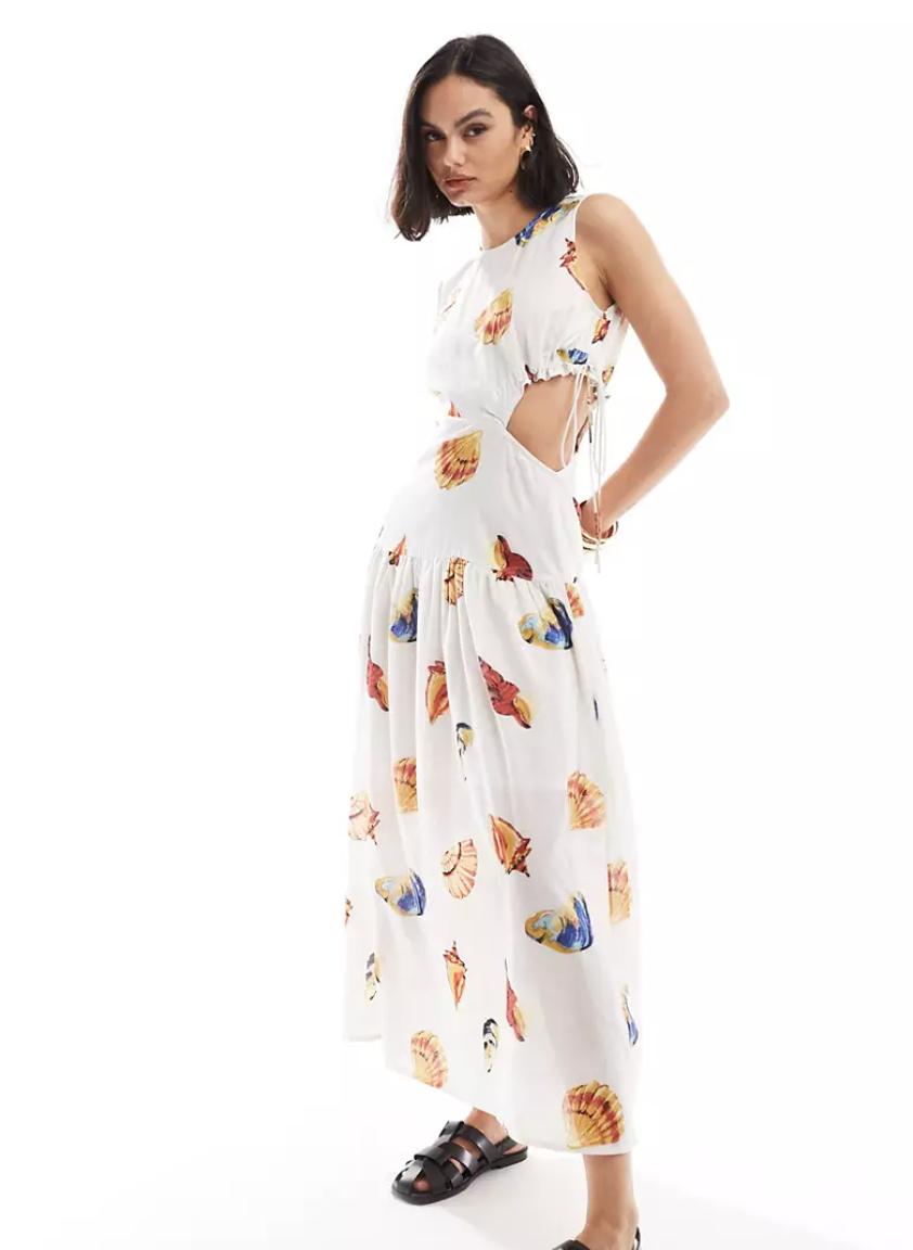 Sleeveless cut out midi dress in all over shell print