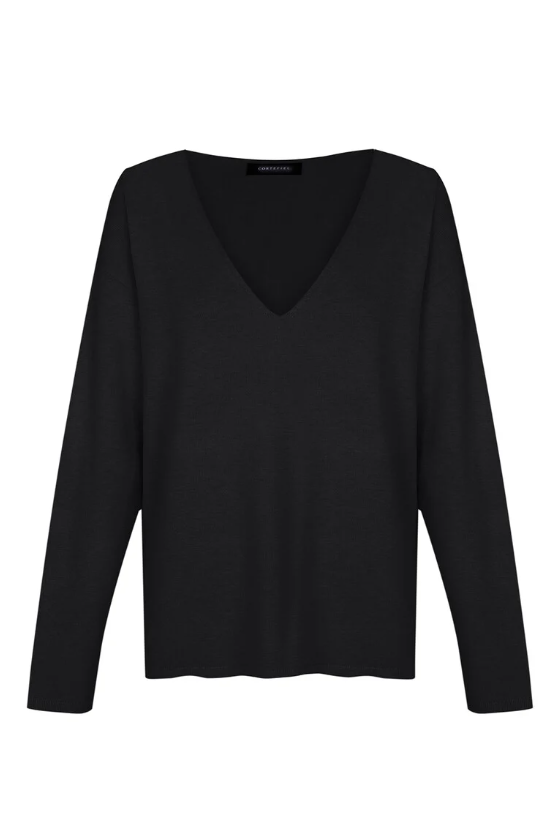 5 looks casuales de Carolina de Mónaco que ahora puedes encontrar rebajados en Cortefiel 16 Moncloa Jersey negro de Cortefiel