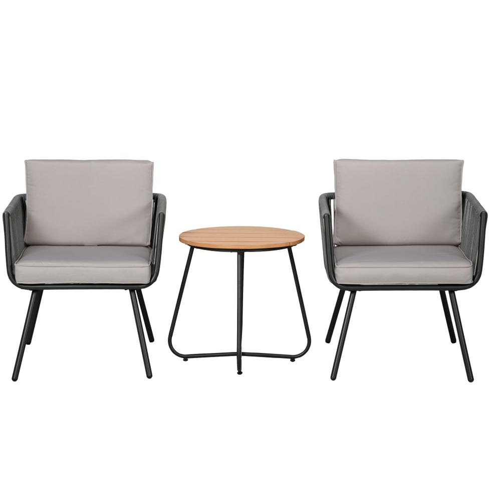 Conjunto de terraza con sillas trenzadas y mesa