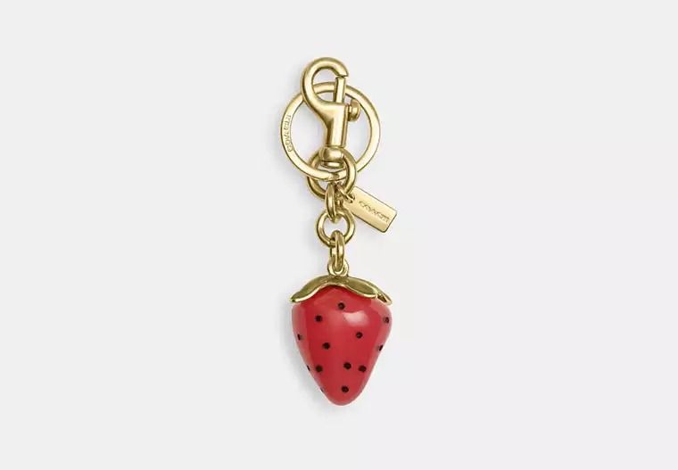 Coach X “Observed By Us” strawberry bag charm