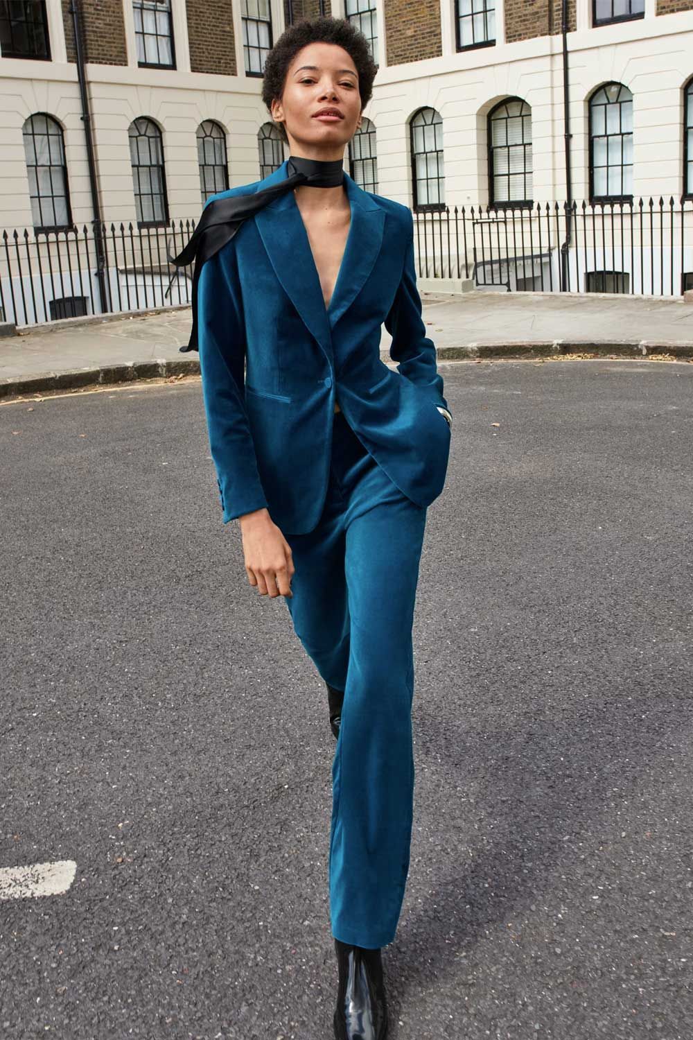 AJ Odudu wears M S velvet suit at the Dress The Nation premiere