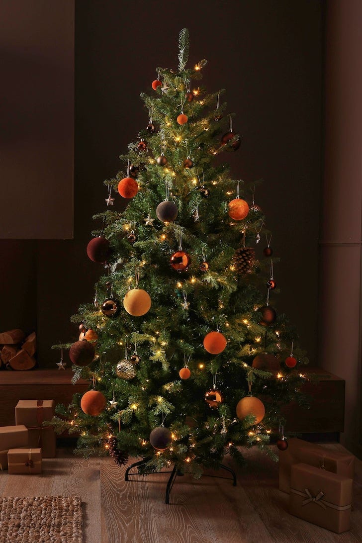 Green Lit Nordman Christmas Tree