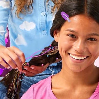 Tinsel Hair Stylist Tinsel Hair Stylist