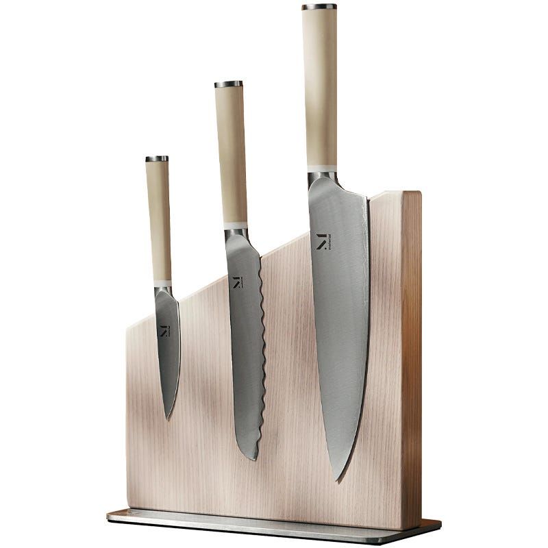 material the knives + stand on a white background