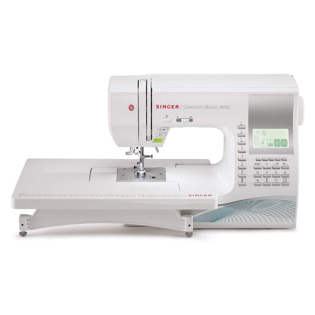 a white singer quantum stylist 9960 computerized sewing machine on a white set, good housekeeping's best sewing machines