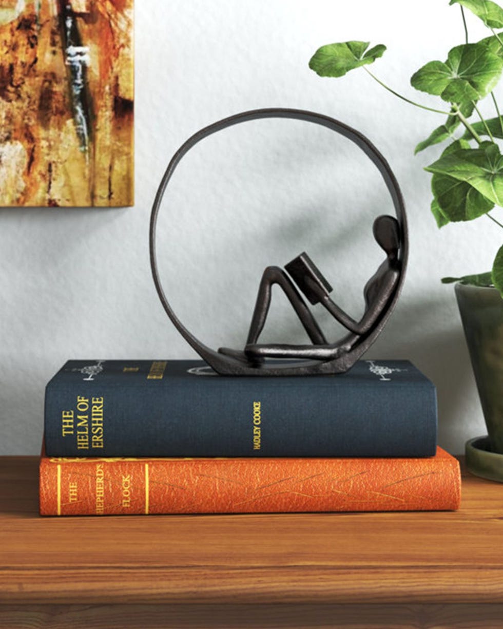 Krahn Encircled Reader Iron Figurine