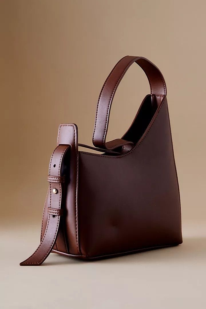 By Anthropologie Asymmetrical Buckle Shoulder Bag