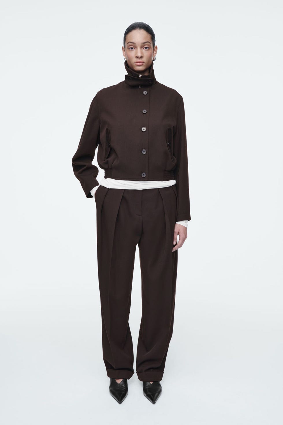  Pleated wool-blend tapered trousers