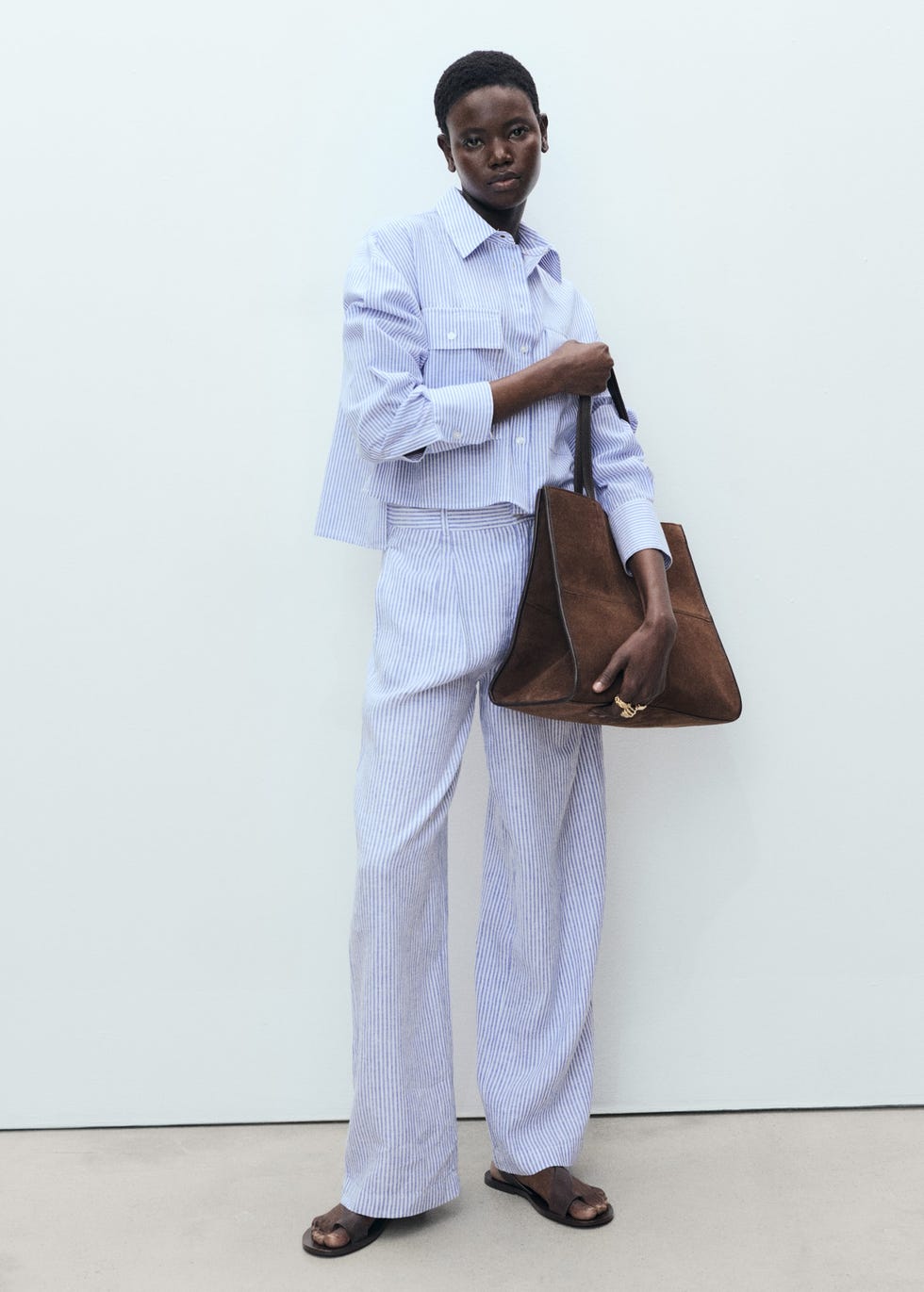 Striped linen-blend trousers