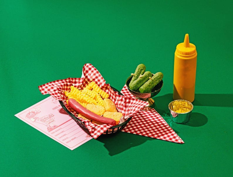 Hot dogs and fries (with pickles)