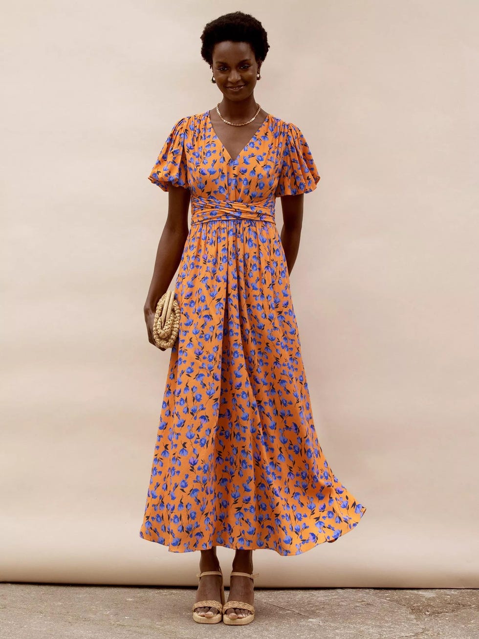 The tropical wedding: Puff-sleeve floral dress in orange and cornflower blue by Ro&Zo