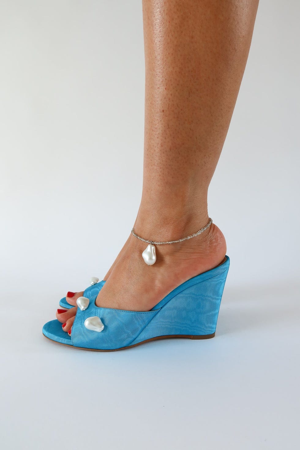 Kourtney Aqua Blue Moire coin