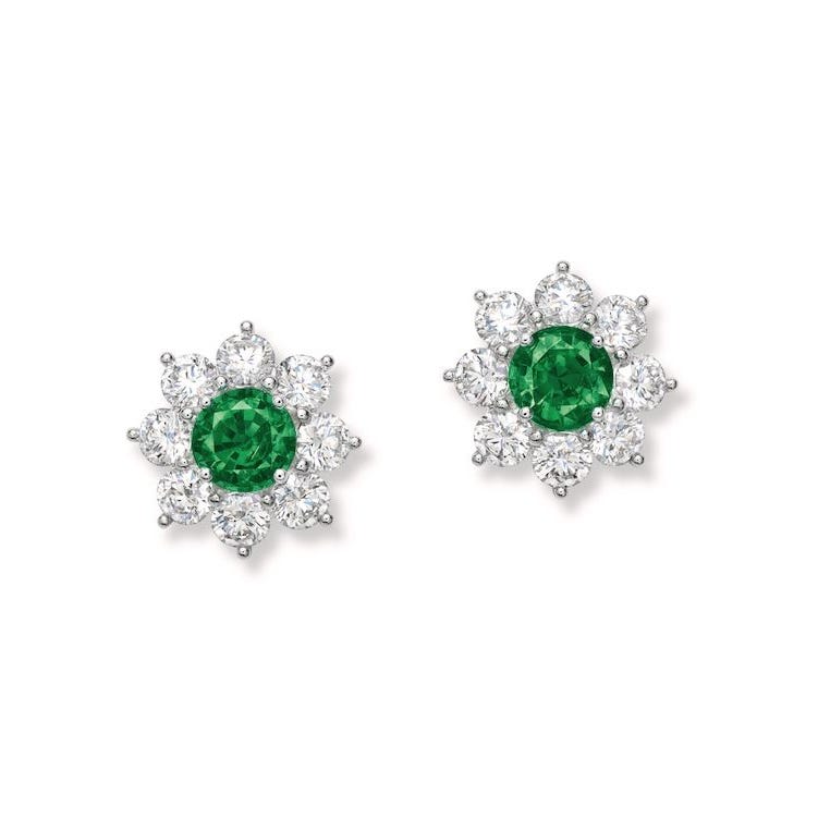 Brincos de esmeralda e diamante em forma de flores