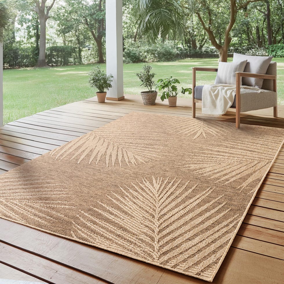 Alfombra con efecto de yute natural con dibujo de hojas