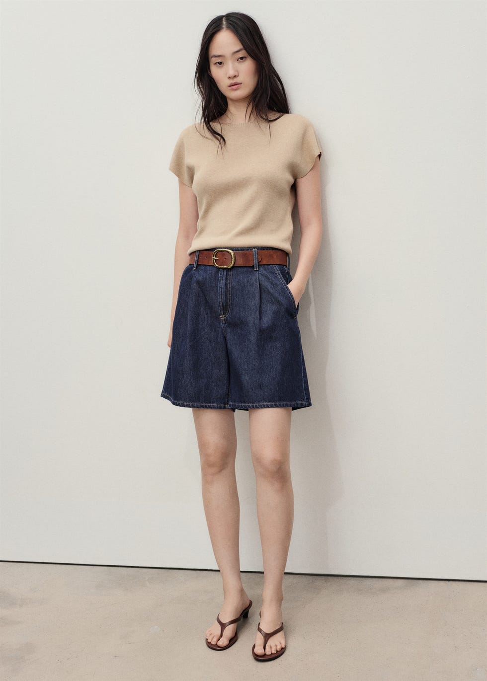 Mid-rise denim bermuda shorts with pleats